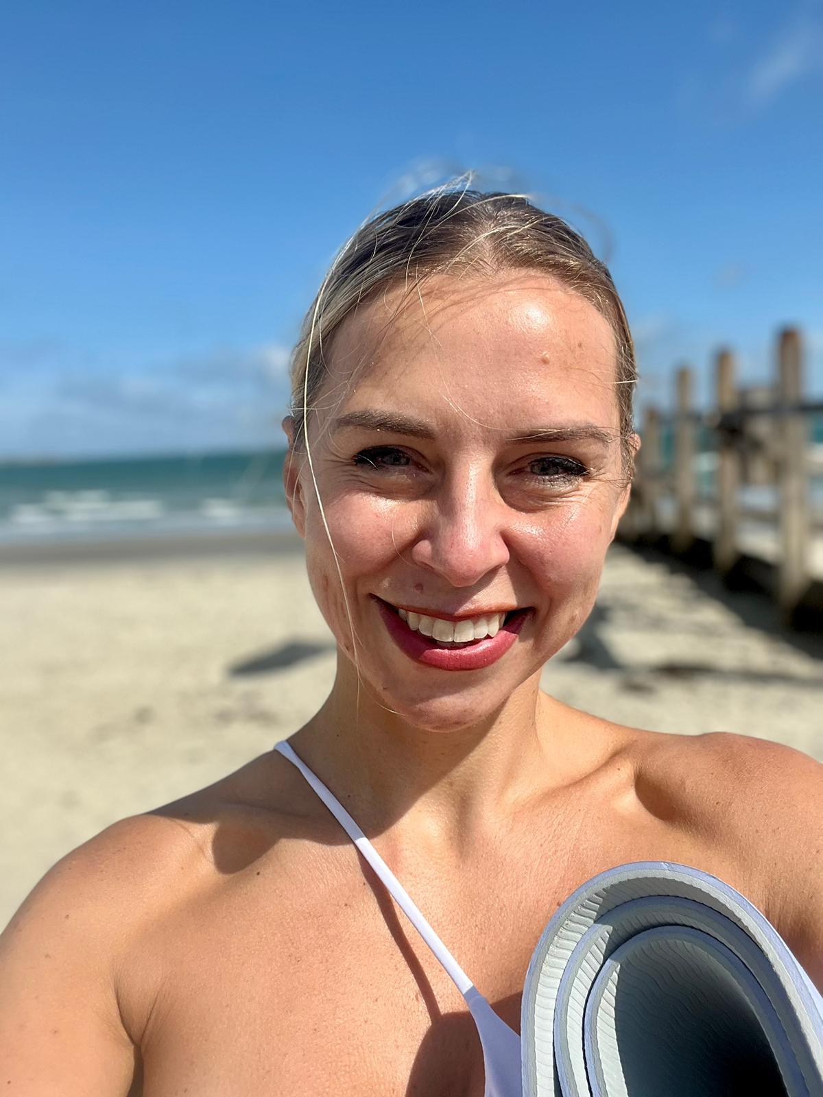 UlaTrains Group Yoga class in London, students practising standing poses together